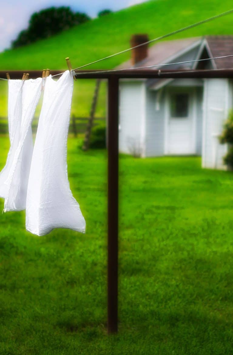 clothes line with white sheets