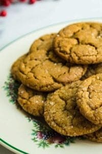 brown cookies with sugar on green and white plate