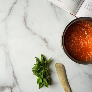 marble counter with pan and wooden spoon