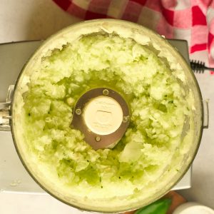 food processor with chopped cucumbers