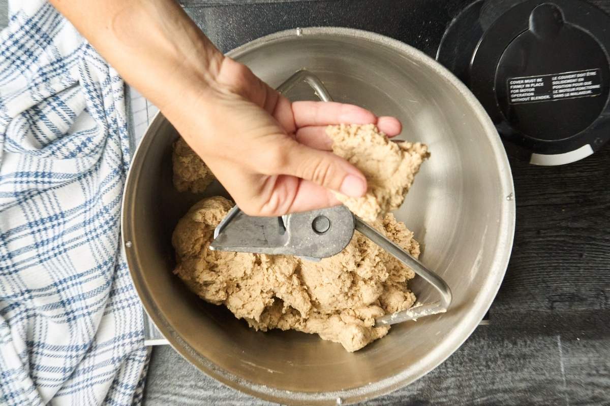 dough in stand mixer before kneading.