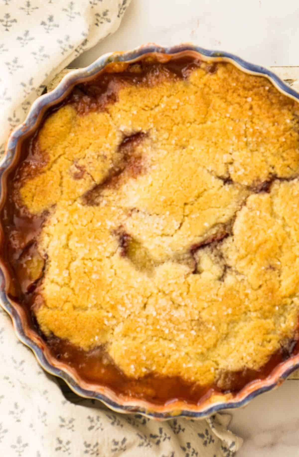 plum cobbler on white surface