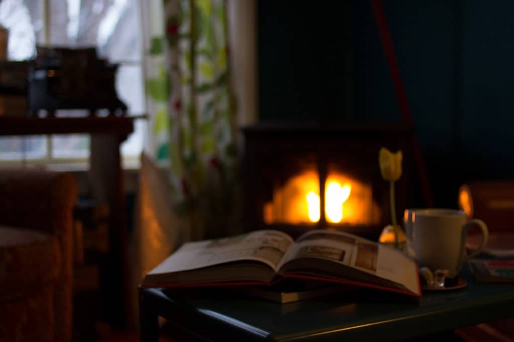 wood stove with open book in front