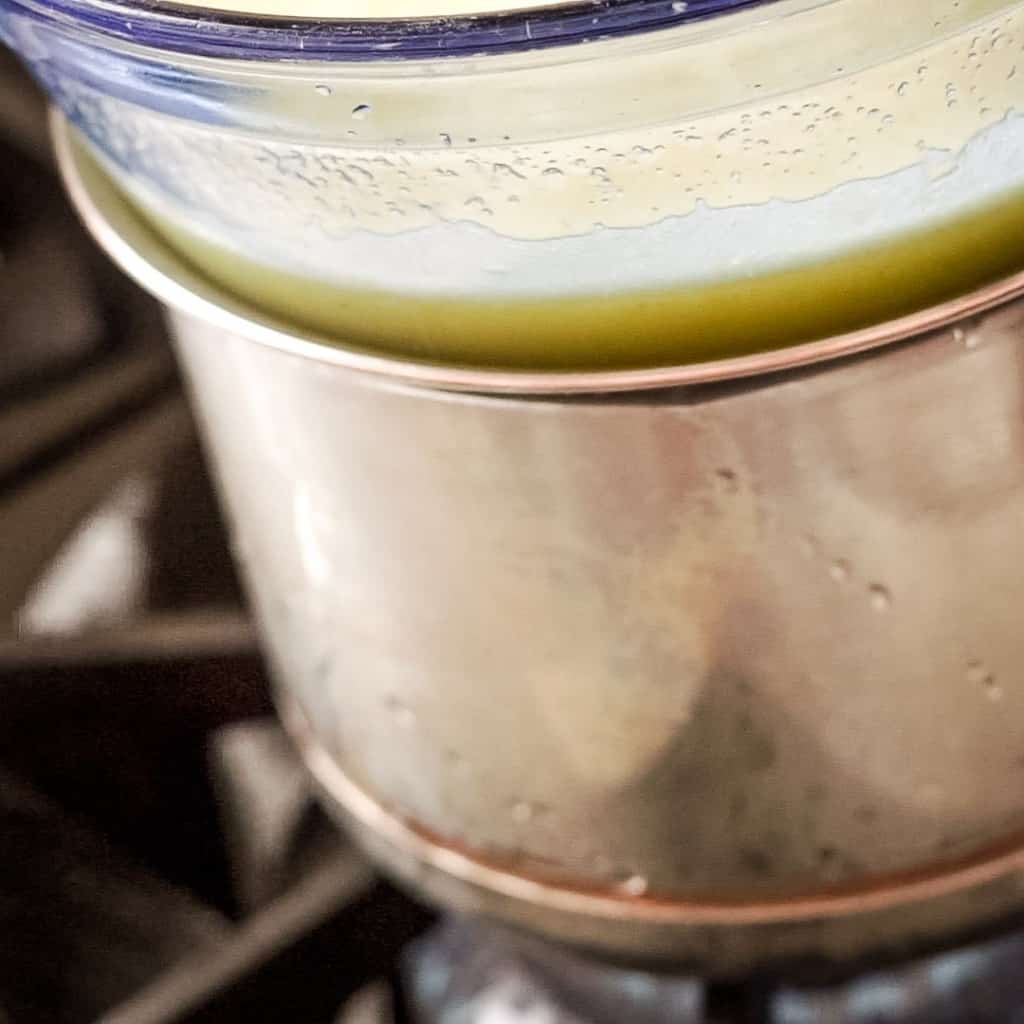 pan on stove with bowl on top