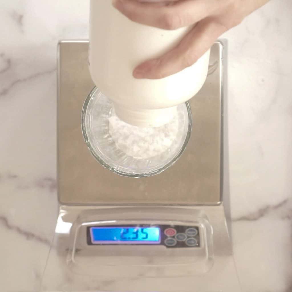 measuring lye on digital scale  