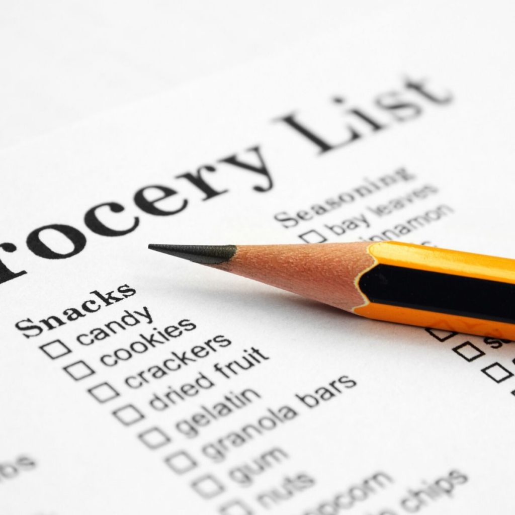 grocery list and pencil