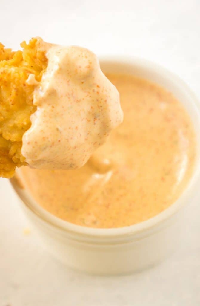 chicken tender dipped in cajun ranch