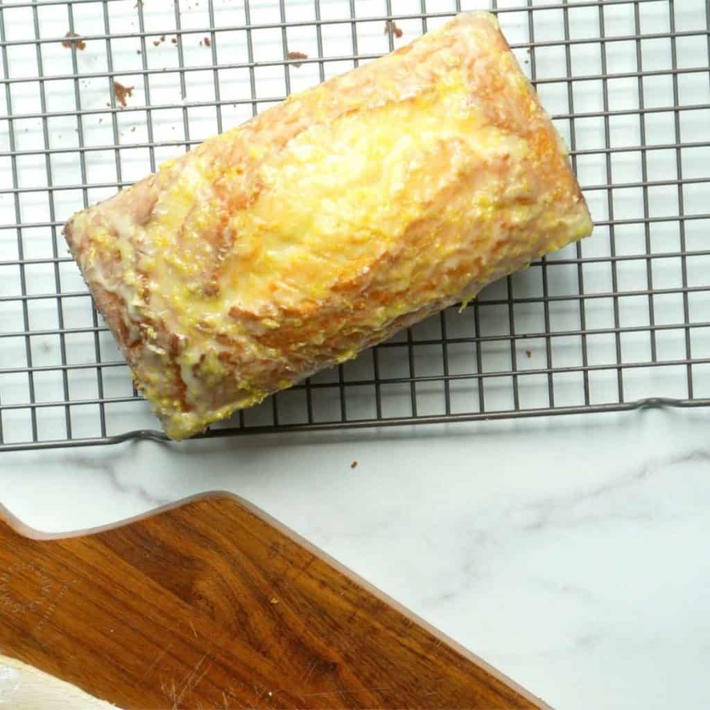 wire rack with glazed cake