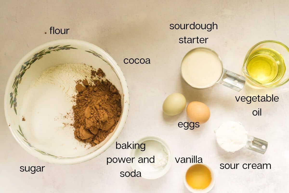 cake ingredients laid out on white surface