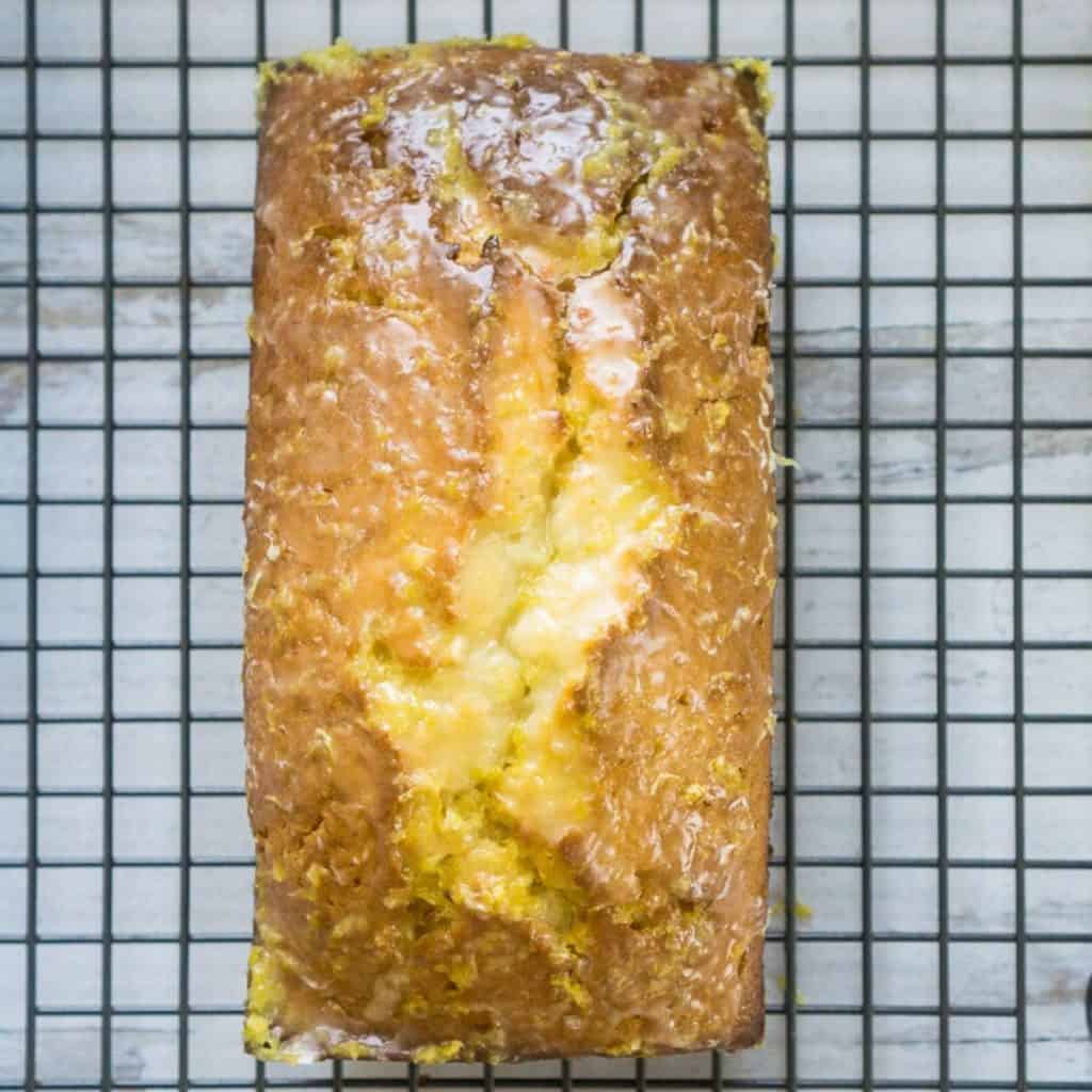 sourdough lemon cake on cooling rack