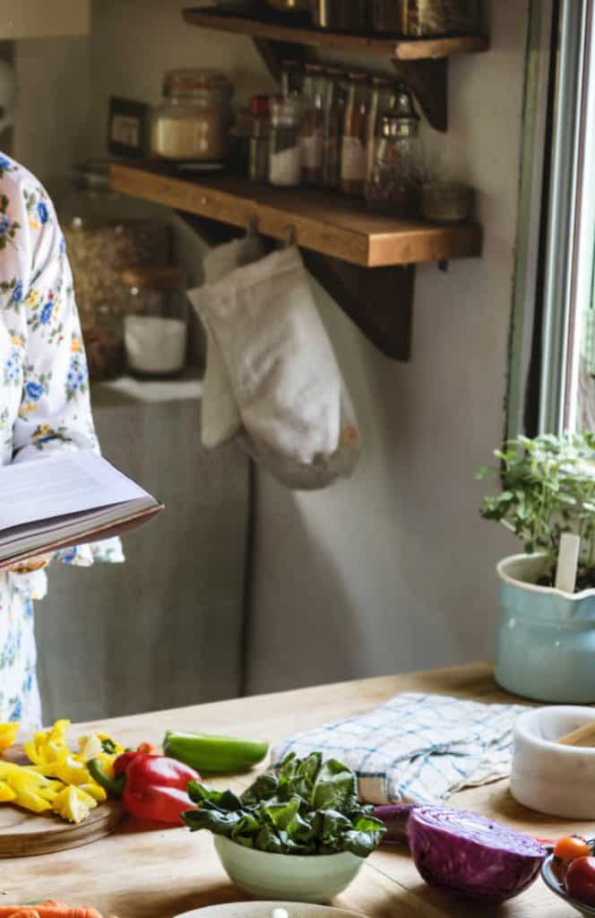 cookbook in old fashioned kitchen
