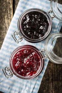 red and blue home canned jam in weck jars