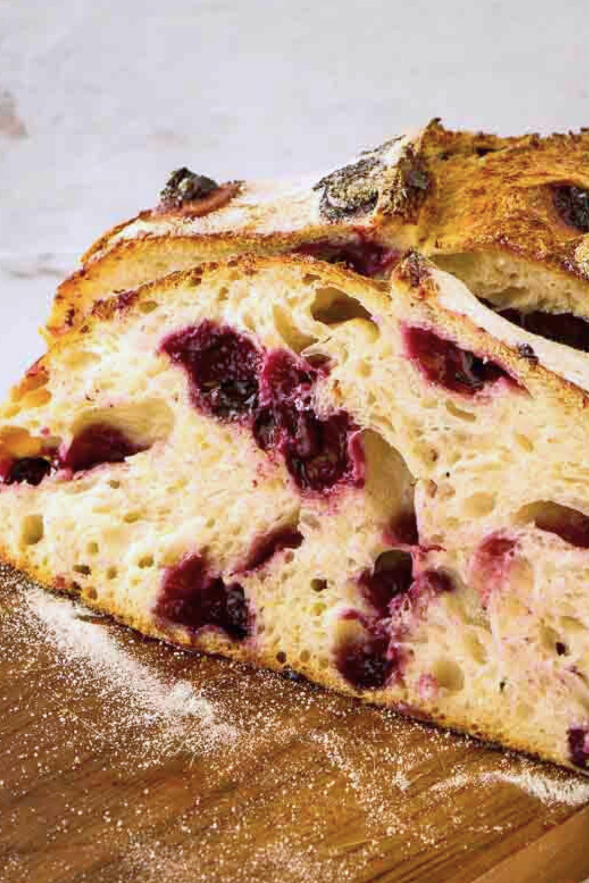 sliced loaf of blueberry lemon sourdough