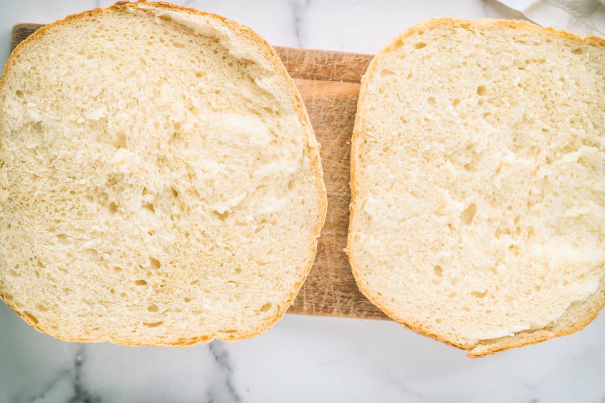 finished loaf sliced in half showing inside of two pieces.
