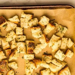 finished sourdough croutons on baking sheet