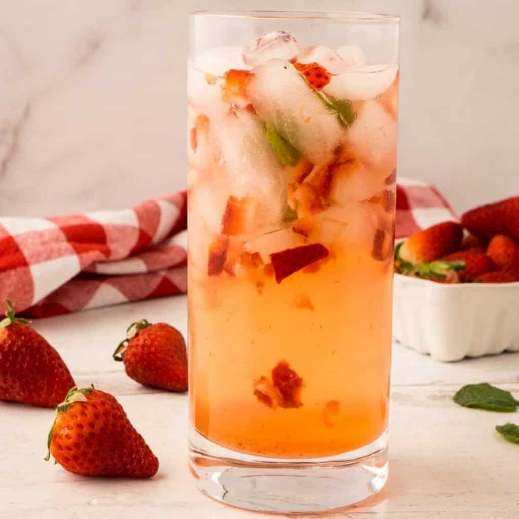 strawberry cocktail in highball glass