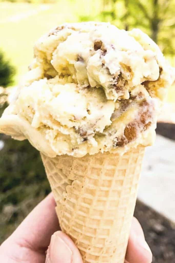 scoops of homemade caramel nut ice cream in cone