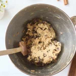 oatmeal raisin cookie dough in metal mixing bowl