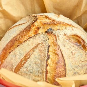 finished sourdough loaf in dutch oven
