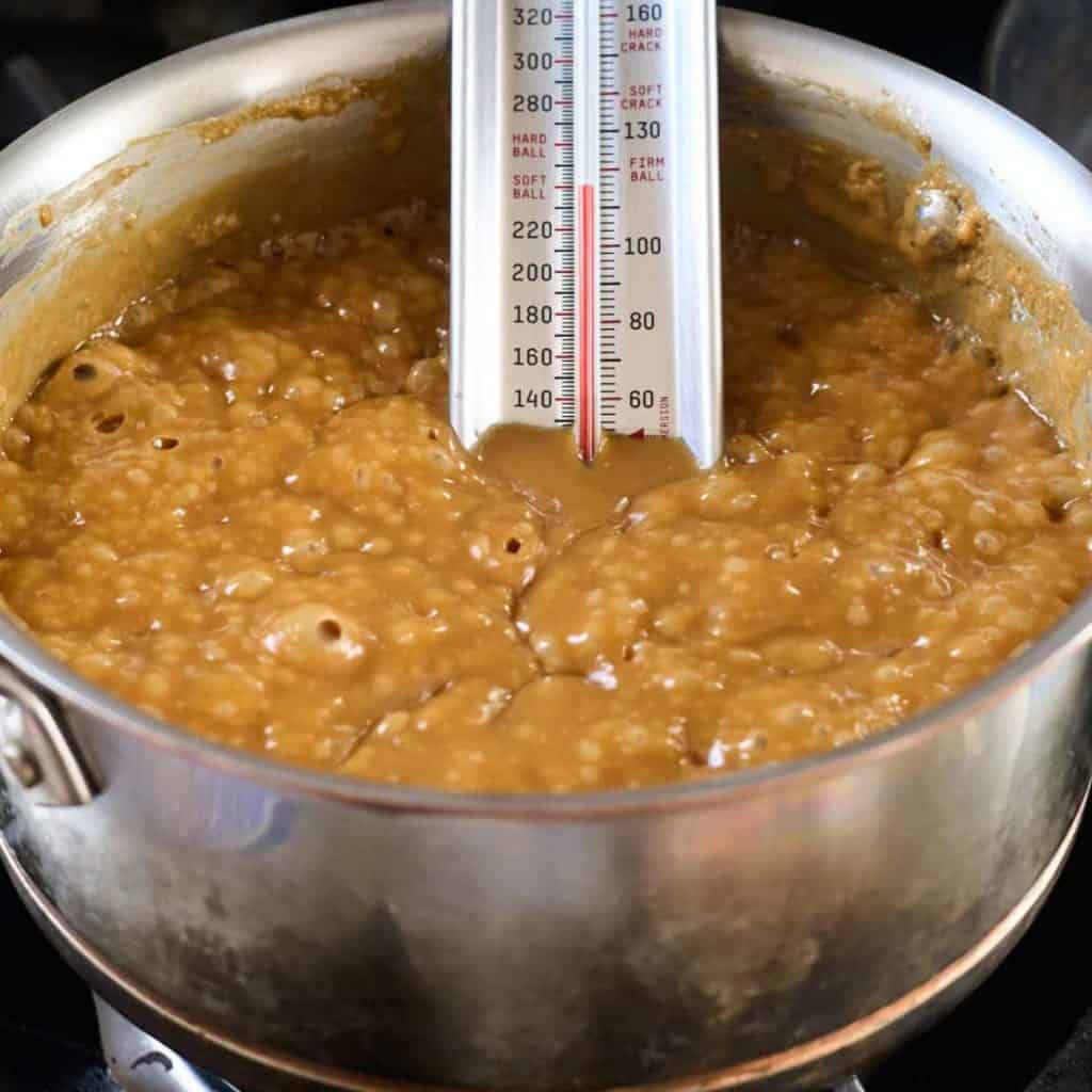 saucepan with bubbling sugar syrup