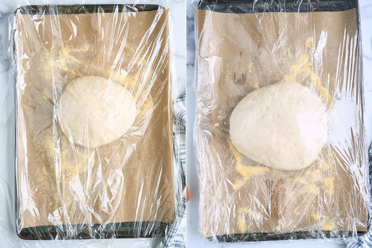 Dough on a baking sheet covered loosely with plastic wrap.