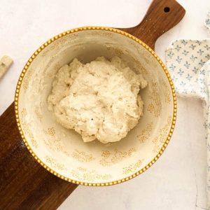 shaggy looking dough in mixing bowl