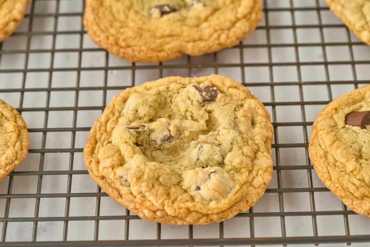 fully baked chocolate chunk cookies on wire cooling rack