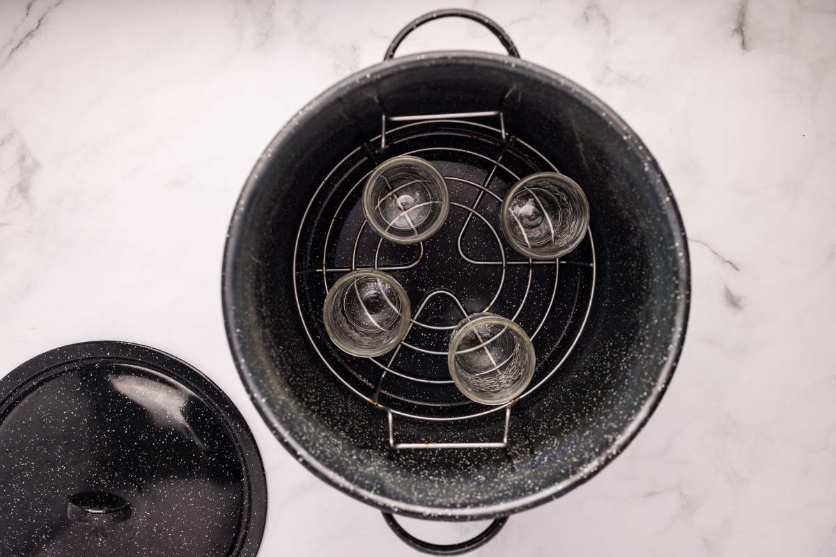 overhead view of empty jars in canner.