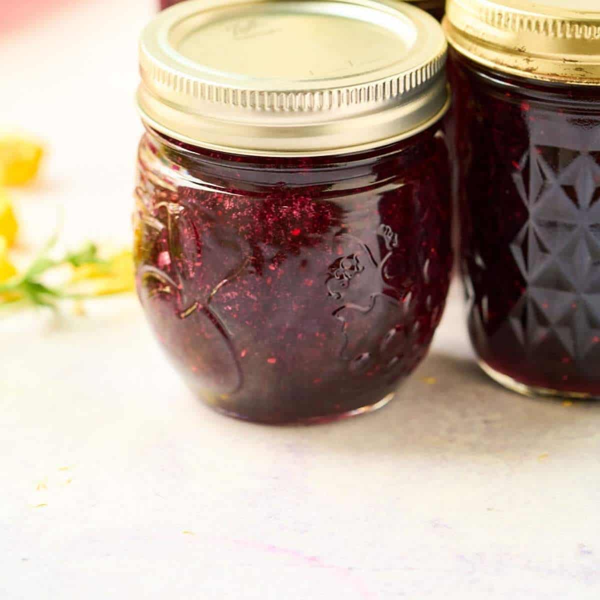 2 glass jars of jam