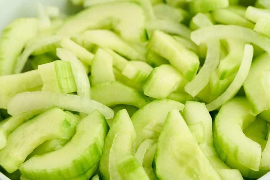 close up view of crescent shaped cucumbers in bowl
