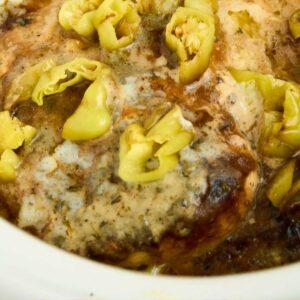 green peppers on top of seasoned chicken