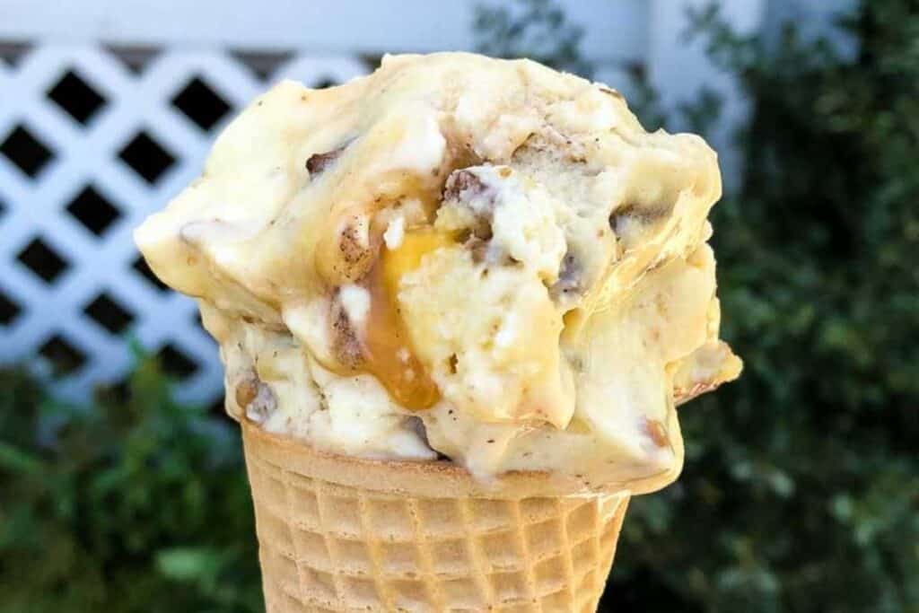 cone of ice cram with caramel swirl