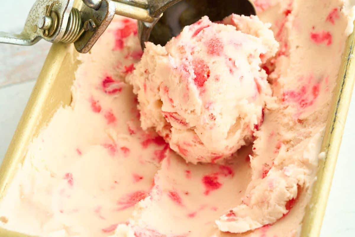 ice cream scoop with scoop of strawberry