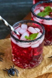 red drink on in short glass.