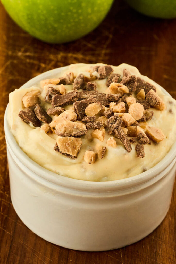 close up view of creamy dip with heath bar on top