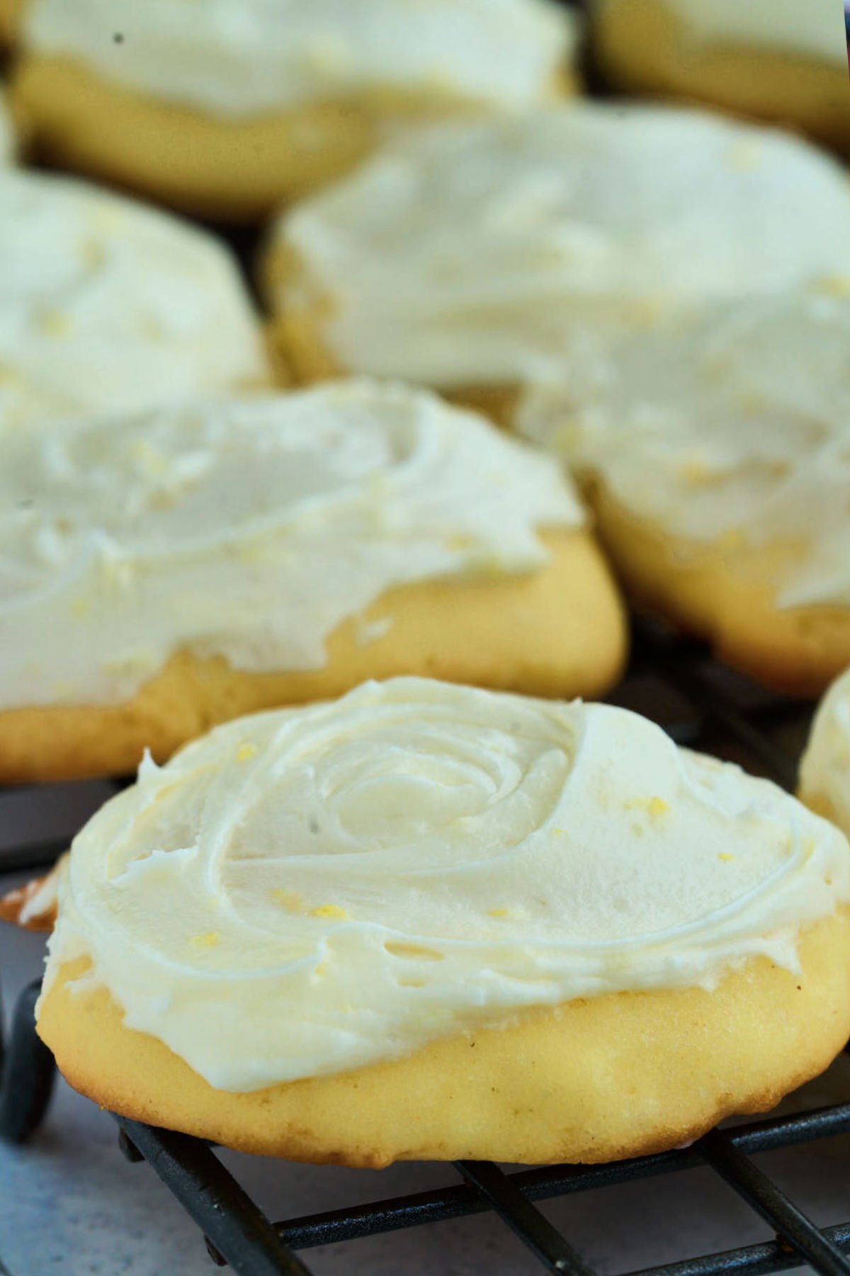 wire rack of finished frosted cookies.
