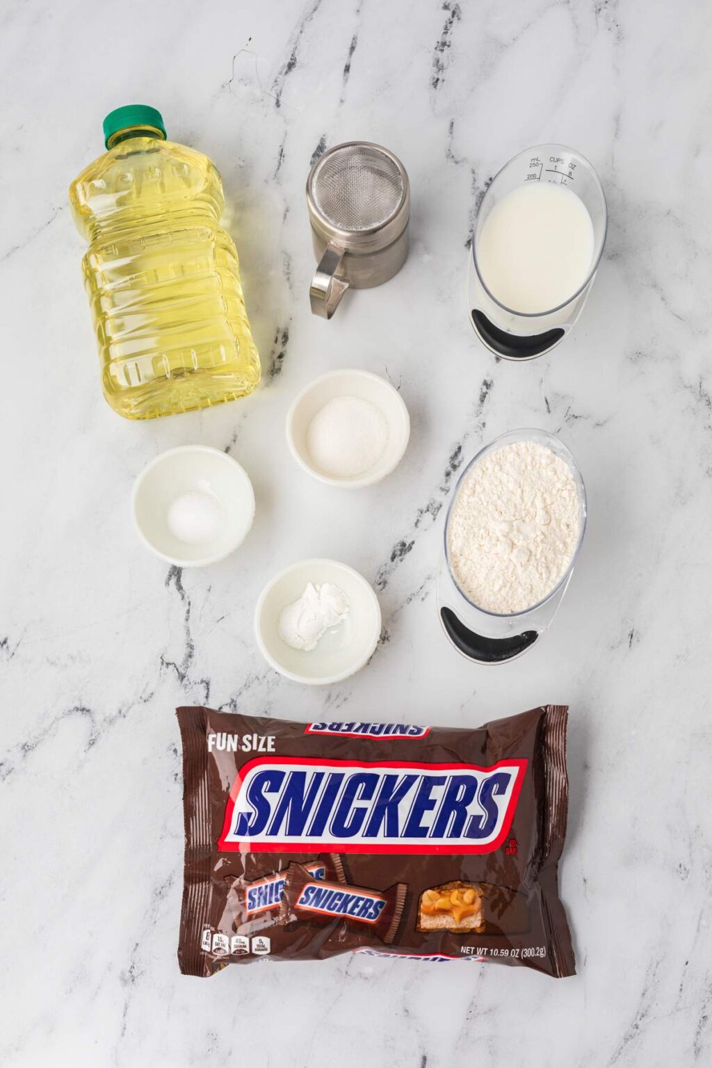 How to Make Sweet + Gooey DeepFried Snickers Bars