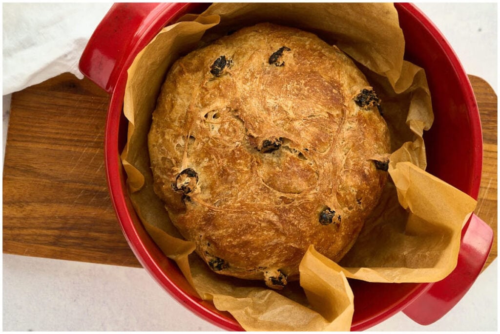 fully baked loaf in red pot.