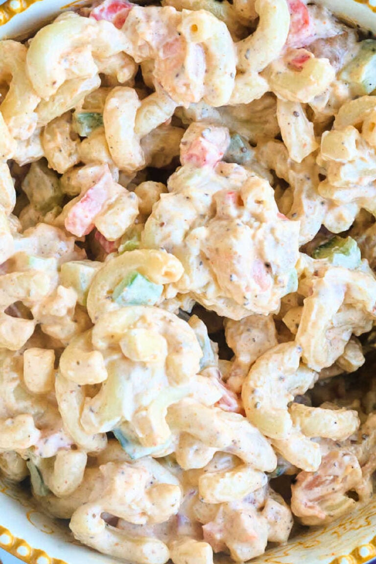 close up of macaroni salad with small shrimp.