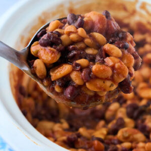 close up view of beans in barbecue sauce.