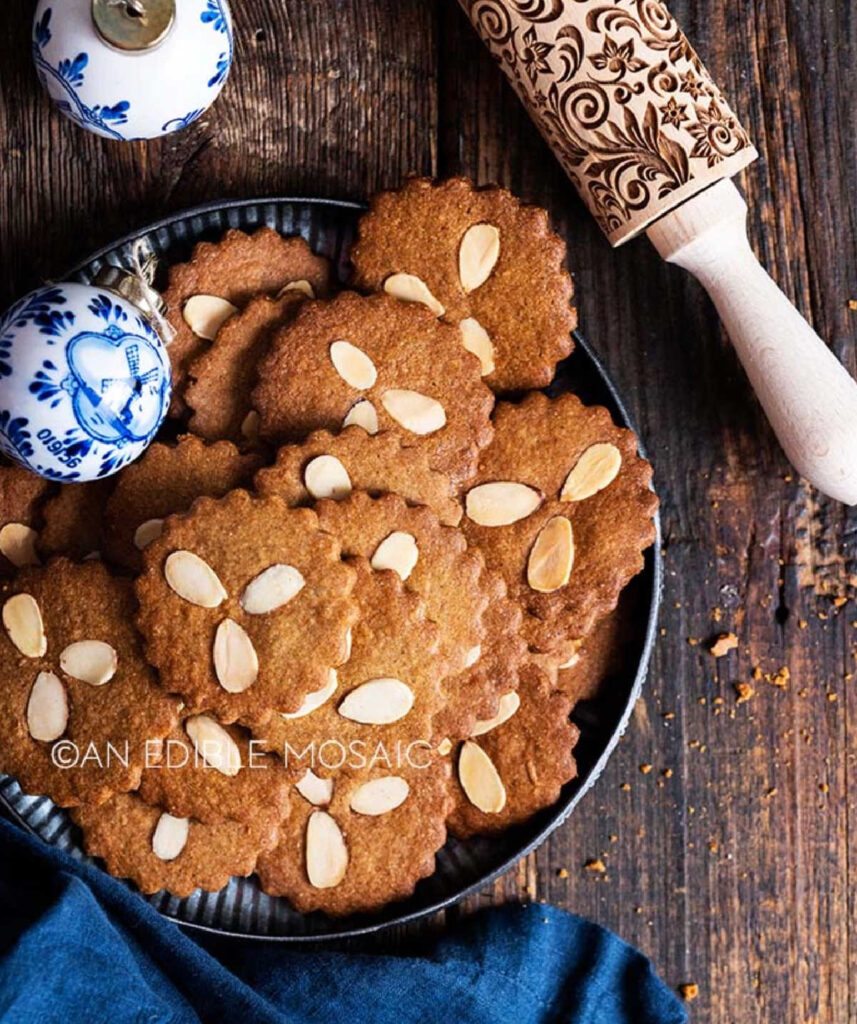 crinkle cut brown cookies with nuts.