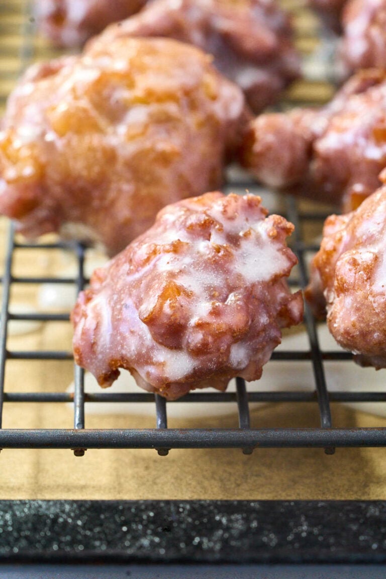 apple fritters on cooling rack.