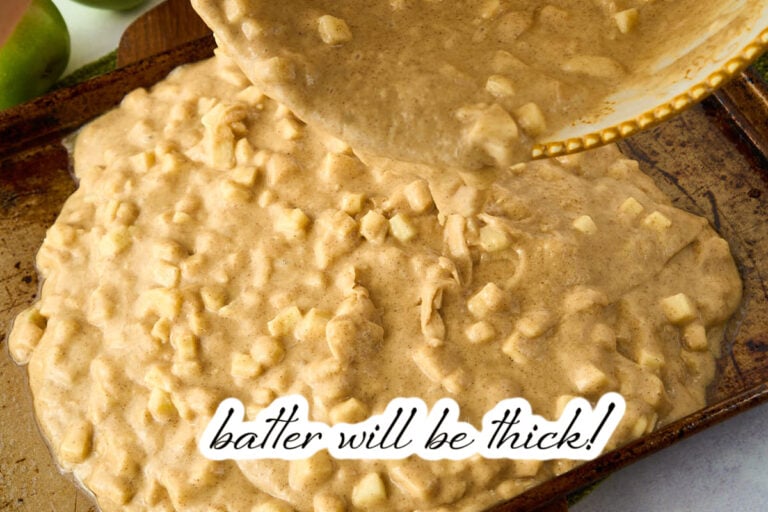 pouring batter with apple chunks into pan.