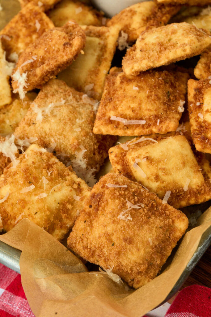 fried ravioli with parmesan on top.