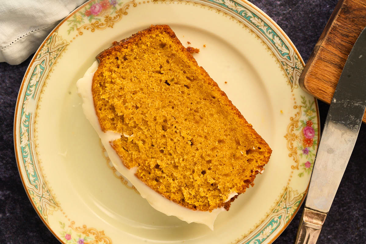 slice of pumpkin bread on small plate.