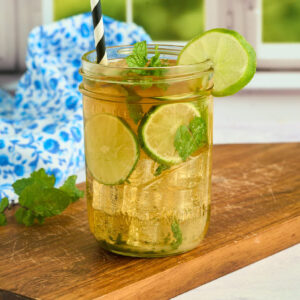finished drink in front of window.