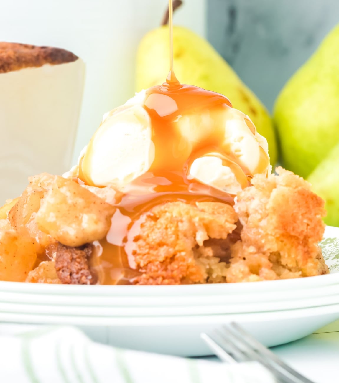 plated cobbler with ice cream and caramel.