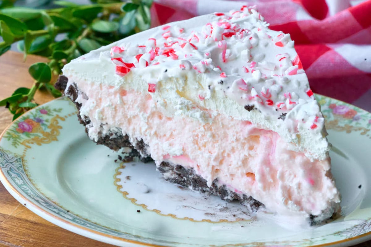 slice of ice cream pie on floral plate.