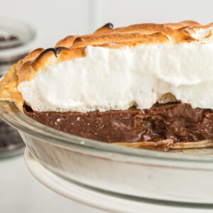 close up view of sliced chocolate meringue pie.