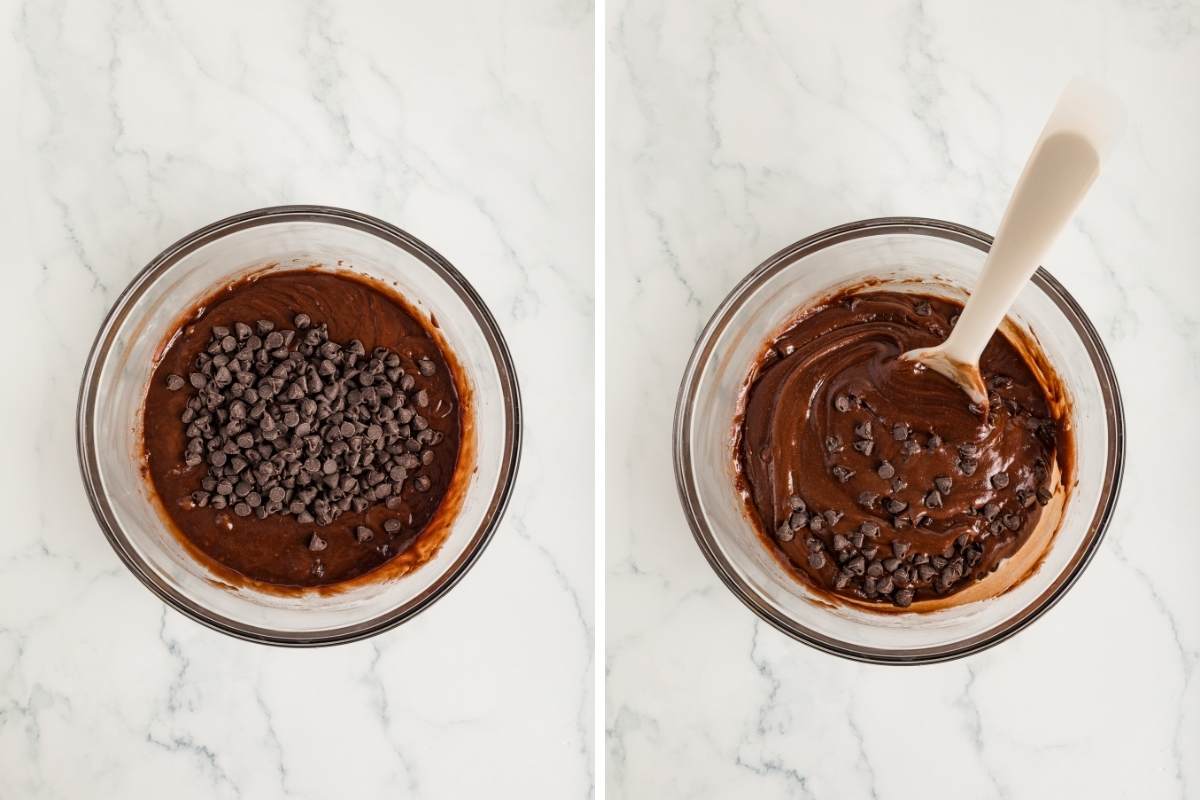 Chocolate chips being added and then folded into dark brownie batter.